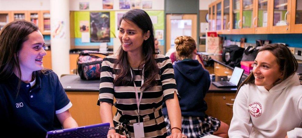 A teacher working with students